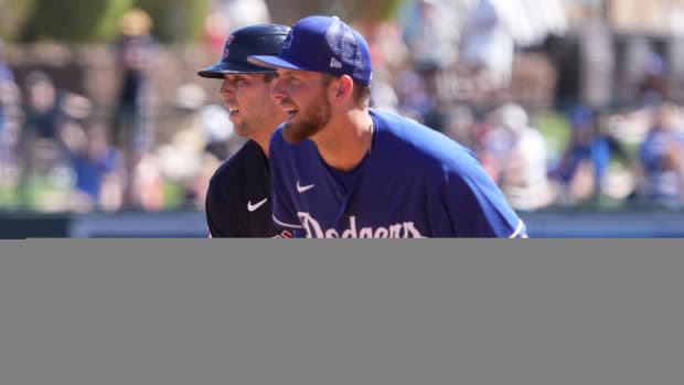 Mar 13, 2023; Phoenix, Arizona, USA; Cleveland Guardians first baseman Micah Prius (81) leads off first base as Los Angeles Dodgers first baseman Michael Busch (83) covers the bag during the second inning at Camelback Ranch-Glendale. Mandatory Credit: Joe Camporeale-USA TODAY Sports